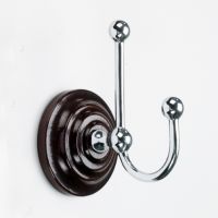 Bright Chrome Hook on wooden backplate Bright Chrome Hook on wooden backplate