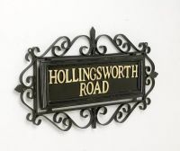 Ornate wrought iron scroll frame