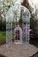 Arched Metal Gazebo In a Garden Arched Metal Gazebo In a Garden