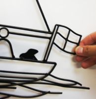 “Alderney Coast” Lighthouse and ship coming into dock wall art