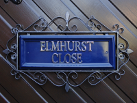 Ornate wrought iron scroll frame