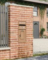 "Autumn Leaves" King George Rex Post Box Front installed on a new home