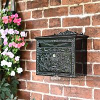 "Horncastle Abbey" Black Wall Mounted Post Box Outside in the Garden