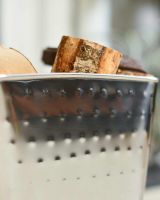 Close-up of "Keatley" Square Stainless Steel Log Holder Close-up of "Keatley" Square Stainless Steel Log Holder