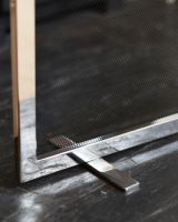 Close-Up of Feet on "Rotherington" Polished Stainless Steel Guard