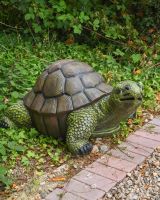 "Terrence" the Tortoise Fibreglass Garden Ornament on the Side of a Garden Gravel Path "Terrence" the Tortoise Fibreglass Garden Ornament on the Side of a Garden Gravel Path