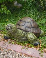 "Terrence" the Tortoise Fibreglass Garden Ornament Shown Side on next to a Garden Path "Terrence" the Tortoise Fibreglass Garden Ornament Shown Side on next to a Garden Path
