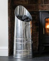 The "The Industrial Mod" Coal Hod Unpainted Version in a Contemporary Home in Front of a Fireplace - Digital Illustration
