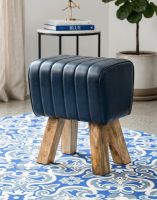 "The Orton" Mango Wood & Blue Leather Stool on a Blue Rug in a Contemporary Living Room - Digital Illustration 