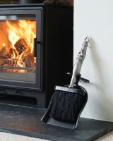 "The York" Brush and Pan Set next to a Modern Fireplace with a lit Log Burner Stove - Digital Illustration "The York" Brush and Pan Set next to a Modern Fireplace with a lit Log Burner Stove - Digital Illustration