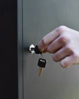 "Titan" Medium Wall Mounted Parcel Box Steel in Black key lock mechanism