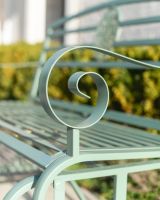 "Arcadia" Garden Rocking Bench Wrought Iron - Sage close up of armrest "Arcadia" Garden Rocking Bench Wrought Iron - Sage close up of armrest