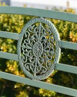 "Arcadia" Garden Rocking Bench Wrought Iron - Sage close up of detailing on backrest "Arcadia" Garden Rocking Bench Wrought Iron - Sage close up of detailing on backrest