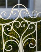 "Belvedere" Wrought Iron Garden Bench - Cream close up of detailing on backrest