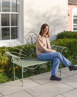 ‘Bordeaux" Wrought Iron Garden Bench - Sage with lady sat on Bech