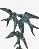 "Celestial Ascent" Cast Brass Sculpture close up on beaks