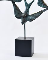 "Celestial Migration" Cast Brass Bird Sculpture close up of supporting base