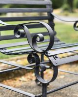 Close-Up of Ornate Armrest on Black “Chatham" One Seater Park Bench