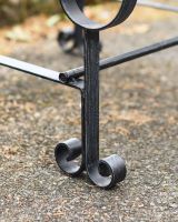 Close-Up of Integral Leg Supports for Black “Chatham" One Seater Park Bench