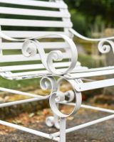 Close-Up of Ornate Armrest for Cream “Chatham" One Seater Park Bench