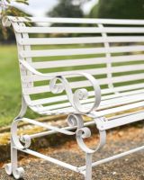 Close-Up of Ornate Armrest on Cream “Chatham" Two Seater Park Bench Close-Up of Ornate Armrest on Cream “Chatham" Two Seater Park Bench