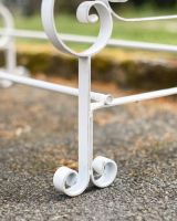 Close-Up of Integral Legs on Cream “Chatham" Two Seater Park Bench Close-Up of Integral Legs on Cream “Chatham" Two Seater Park Bench