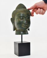 "Emerald Serenity" Buddha Head Ornament in Cast Brass - Rich Verdigris with hand in shot for scale