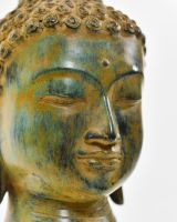 "Emerald Serenity" Buddha Head Ornament in Cast Brass close up of face