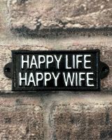 "Happy Life Happy Wife" Traditional Cast Iron Wall Sign mounted on a brick wall