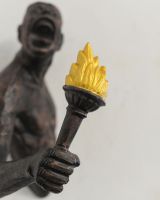 "Ignite" Cast Aluminium Wall Art in Bronze and Copper Finish close up of flaming torch