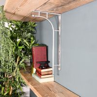 ’Kepler’ Polished Aluminium Modern Wall Bracket Holding a Wooden Shelf ’Kepler’ Polished Aluminium Modern Wall Bracket Holding a Wooden Shelf