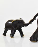 "Matriarch"s Guidance" Cast Brass Elephant Ornament close up of child