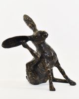 "Meadow Muse" Cast Brass Grooming Hare Sculpture angled view of hare