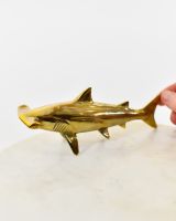 "Meridian" Hammerhead Shark Ornament in Cast Brass with hand in shot for scale
