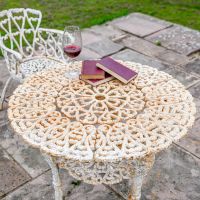 View of the top of the "Merriweather" Round Cast Aged Rustic Cream Iron Victorian Table