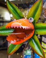 ‘Nibbler’ the Upcycled Metal Flower Garden Sculpture close up shot with sparks