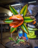 ‘Nibbler’ the Upcycled Metal Flower Garden Sculpture main image with welding sparks