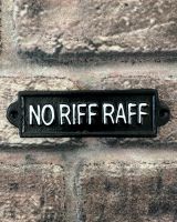 "No Riff Raff" Traditional Cast Iron Wall Sign mounted on a brick wall