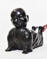 "Peaceful Cobra" Monk Yoga Ornament in Cast Brass with hand in shot for scale