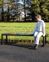 "Prism" Upcycled Oil Drum Garden Bench lady sat on bench