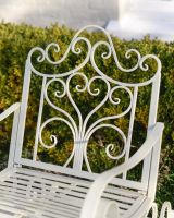 "Province" Wrought Iron Cream Garden Rocking Chair close up of back rest "Province" Wrought Iron Cream Garden Rocking Chair close up of back rest