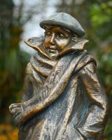 "Rain or Shine" Male Resin Garden Sculpture Brass and Verdigris Finish close up of head