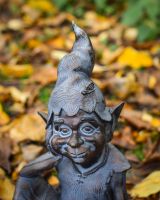 "Reminiscing Pixie" Resin Garden Sculpture Bronze and Verdigris close up of hat