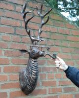 "Ronnie" the Stag Humourous Cast Aluminium Wall Art to scale with hand in shot "Ronnie" the Stag Humourous Cast Aluminium Wall Art to scale with hand in shot