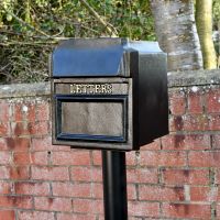 Close-up of the “Royal Farringdon” Black Post Box