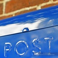 Close-up of the Contemporary Lid on the Top of the Post Box