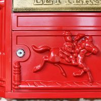 Close-up of the Design on the Traditional Wall Mounted Post Box