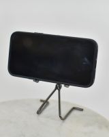 "Score" Celebration Upcycled Metal Phone Holder holding phone from the front