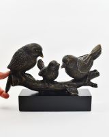 "Shadowed Songbirds" Cast Brass Ornament with hand in shot for scale