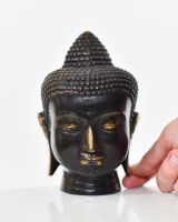 "Silent Sermon" Cast Brass Ornament with hand in shot for scale